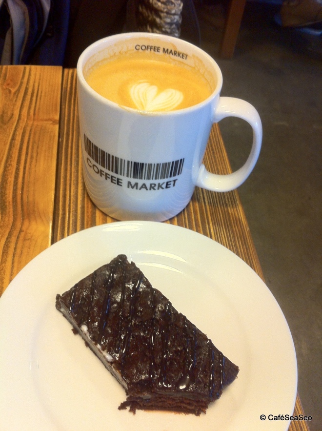 Vanilla latte and a brownie at the Coffee Market
